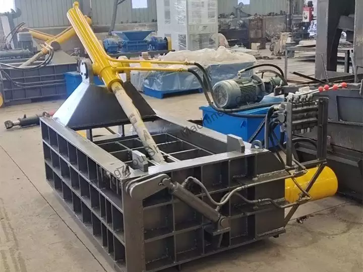 Metal scrap baling press