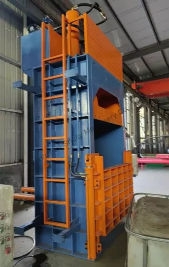 Hydraulic baling press for waste tires